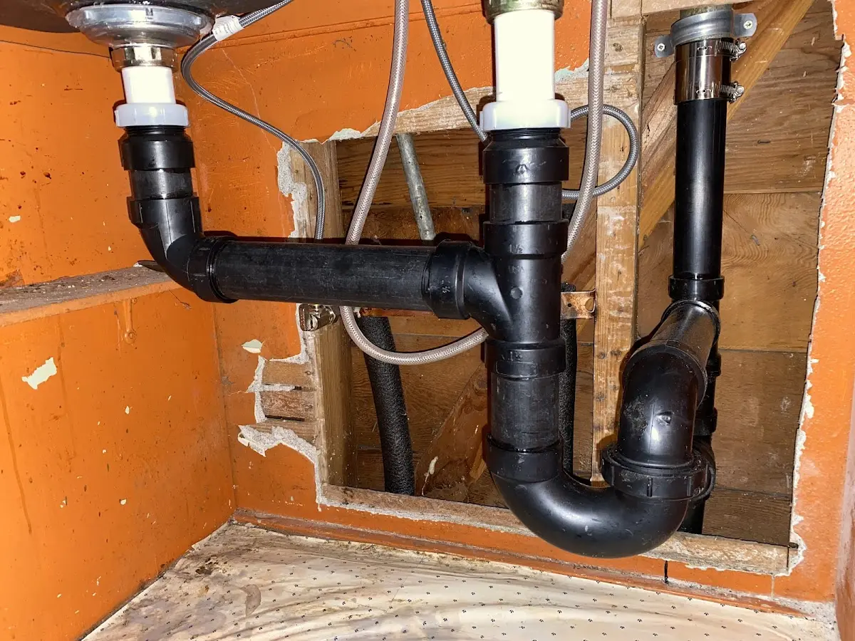 Professional Garbage Disposal Repair equipment and tools on the job in Saco